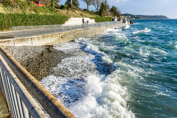 Sea Wall And Windy Surf