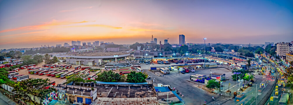 Aerial image of Bangalore bus terminus in the evening with nice orange blue color sky during Sunset .