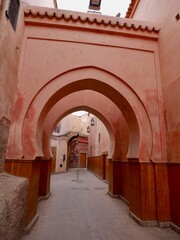 Arches in front of the 14th century Ben Youssef Madrasa, islamic college, in the Medina of...