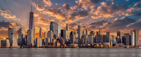 Amazing panoramic view of New York City skyline and skyscraper at sunset. Beautiful view of...