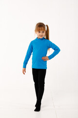 Fototapeta premium A little girl and her older brother in thermal clothes.