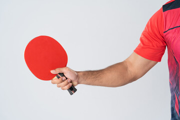 Portrait of sports man male athlete playing table tennis isolated.