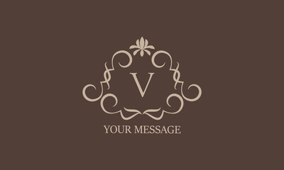 Decorative floral pattern. Heraldic symbols. Initial V for monogram and exclusive calligraphic design elements. Vector business sign, identity for hotels, restaurants, jewelry, fashion.