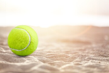 Classic colored tennis ball, sport concept.