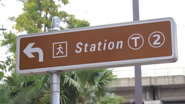 Station T2 sign leading to the tram station in Paris, France