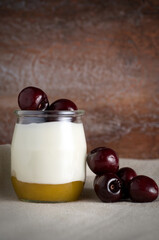 Macro Image of Nature Yogurt with Dark Cherries