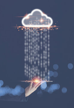 Technology cloud computing concept. Businessman holding tablet on hand with Technology virtual cloud computing upload and download databases.