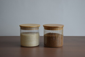 Coffee and sugar in jar with wooden lid 