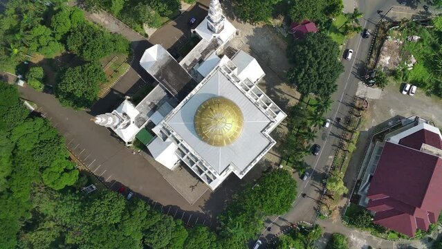 4K footage aerial view of the Baitul Faidzin Grand Mosque at noon in the middle of the central government administration.