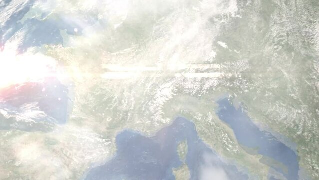 Earth zoom in from outer space to city. Zooming on Martigny, Switzerland. The animation continues by zoom out through clouds and atmosphere into space. Images from NASA