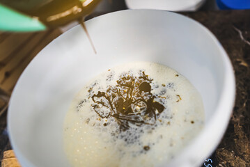 Pistachio ice cream ingredients mixing in a bowl. High quality photo