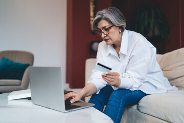 Middle aged female making online order