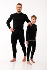 Father and son in thermal underwear on a white background