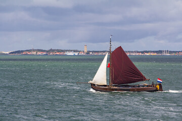 Fototapeta premium Boat passing Waddeen island Terschelling Friesland province in The Netherlands