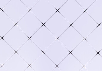 Close-up view of a white brick wall background in diamond shape