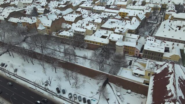 Drone video of the city center of Sibiu, Romania. Footage was taken from a drone at a lower altitude, in winter season, above the boulevard, Haller Bastion and the Citadel Street.