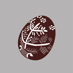 Hand drawn Easter egg with white lines on a brown background. Ethnic traditional motif ukrainian national pattern swirls

