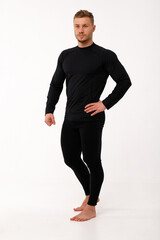 A man with a sporty physique in thermal underwear.