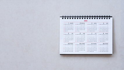 close up white calendar on table