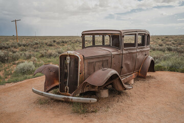 Old car at former Route 66 location Petrified Forest and Painted Desert National Park in Arizona