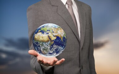 Business person hold a world Globe.