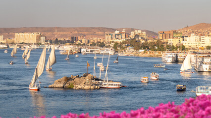 Aswan, Egypt; February 17, 2023 - A view of the Nile at Aswan, Egypt	 - obrazy, fototapety, plakaty