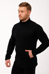A man with a sporty physique in thermal underwear.