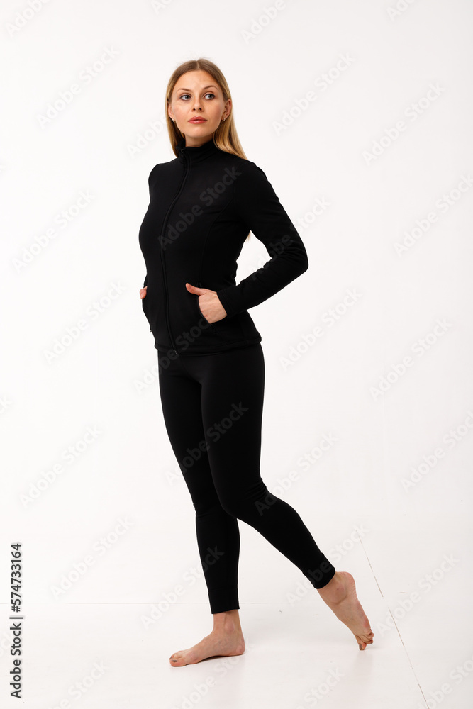 Wall mural Sporty blonde girl in thermal clothing for women