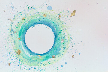 Watercolor stylized circle in blue-green colors on a white background. Hand drawn watercolor.