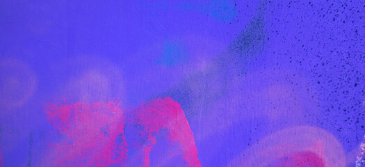Pink, magenta, white painted grunge plaster wall surface background with colorful drips, flows, streaks of paint and paint sprays