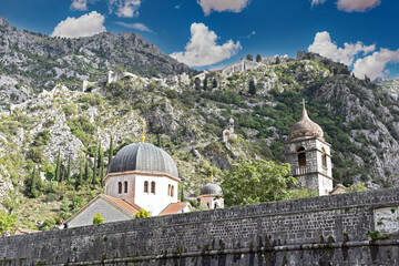 view to the San Giovani Fortress walls above the old adriatic town of Kotor, Montenegro