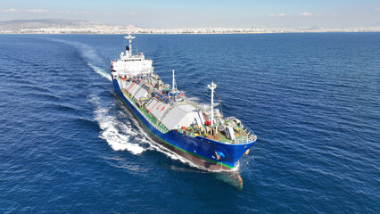 Aerial drone photo of LPG or Liquified Petroleum Gas tanker cruising deep blue Mediterranean sea