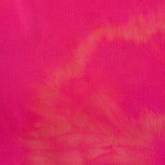 square textile background - fabric painted at home in red with tie-dye stains