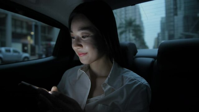 Travel concept of 4k Resolution. Asian women sitting on mobile phones in cars.
