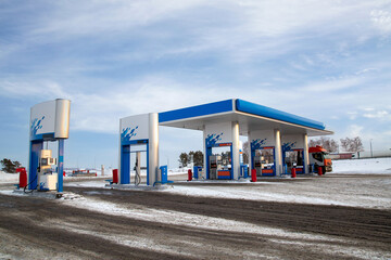 Gas station on a suburban highway. Refueling a truck.