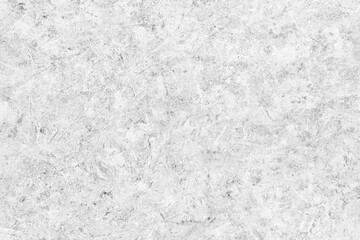 Abstract light grey plastered textured grunge background in the form of a rough covered stucco wall, closeup