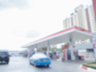 Abstract blur gas station interior. Blurred fuel filling station, soft defocused. Blurry building place of petrol service station background of pump gasoline and diesel oil.