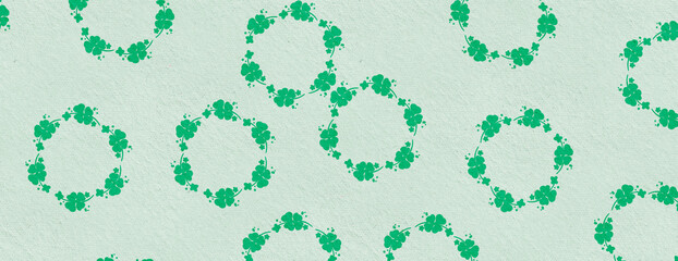 Green shamrocks - abstract background on St Patrick's Day.