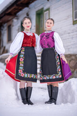 Beautiful woman wearing traditional Eastern Europe folk costumes. Slovak folk costumes.