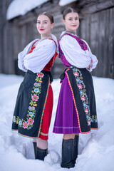 Beautiful woman wearing traditional Eastern Europe folk costumes. Slovak folk costumes.
