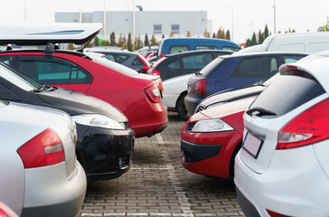 Cars parked in the parking lot. Close-up.