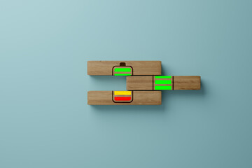 Wooden cubes with a rechargeable battery supplemented with another cube. The concept of charging the battery, supplying energy, creating something new. 3d render, 3d illustration.