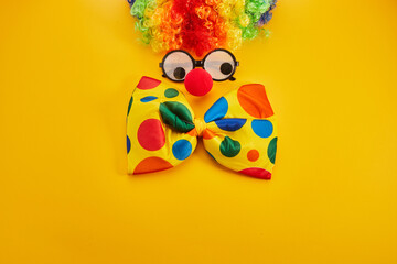 April Fool's day concept. Clown on yellow background