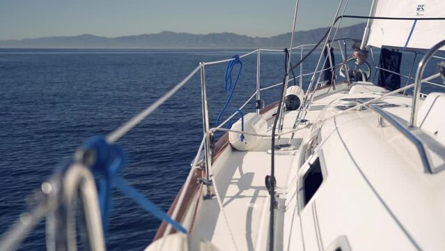 Sailing yacht boat on the ocean on a sunny day, travel adventure