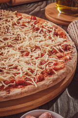 Pizza with mozzarela, bacon and potato sticks (Crunchy) - Closeup.