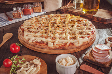 Brazilian pizza with mozzarella, pork loin, mushroons, catupiry and oregano (Pizza especial) - Isolated.