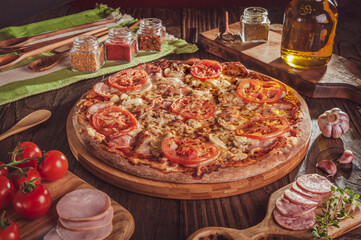 Brazilian pizza with mozzarella, tomato sauce, calabrese sausage, pork loin, mushroom, tomato, parmesan and oregano (Pizza especial) - Isolated.
