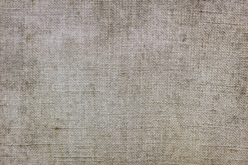 Background, texture of gray burlap from woven fabric close-up. Photography, copy space.