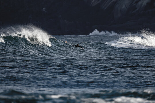 The Lonely Challenge: A Surfer in a Stormy Sea © Rafael