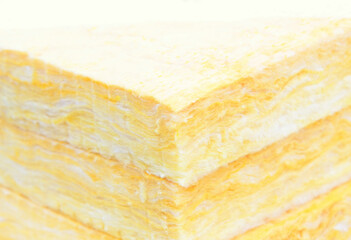 Close-up of the rockwool delivered on construction site for insulation of the walls of new built houses. Mineral wool for  house insulation to reduce energy bill